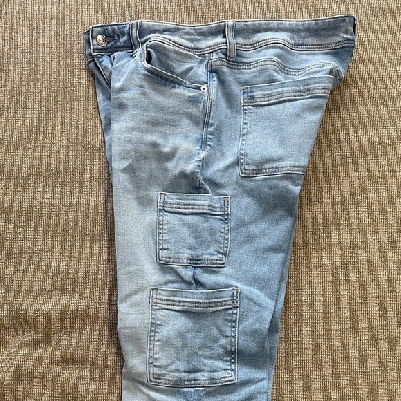 American Eagle Next Level Stretch Kick Boot Carpenter Pockets Light Wash Jeans - Picture 4 of 11